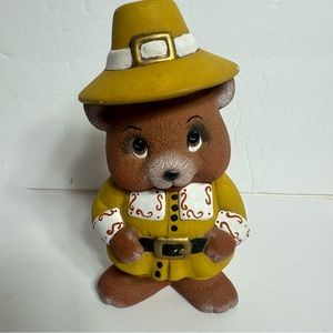 Hand painted pilgrim teddy bear. Adorable ceramic bear wearing yellow outfit